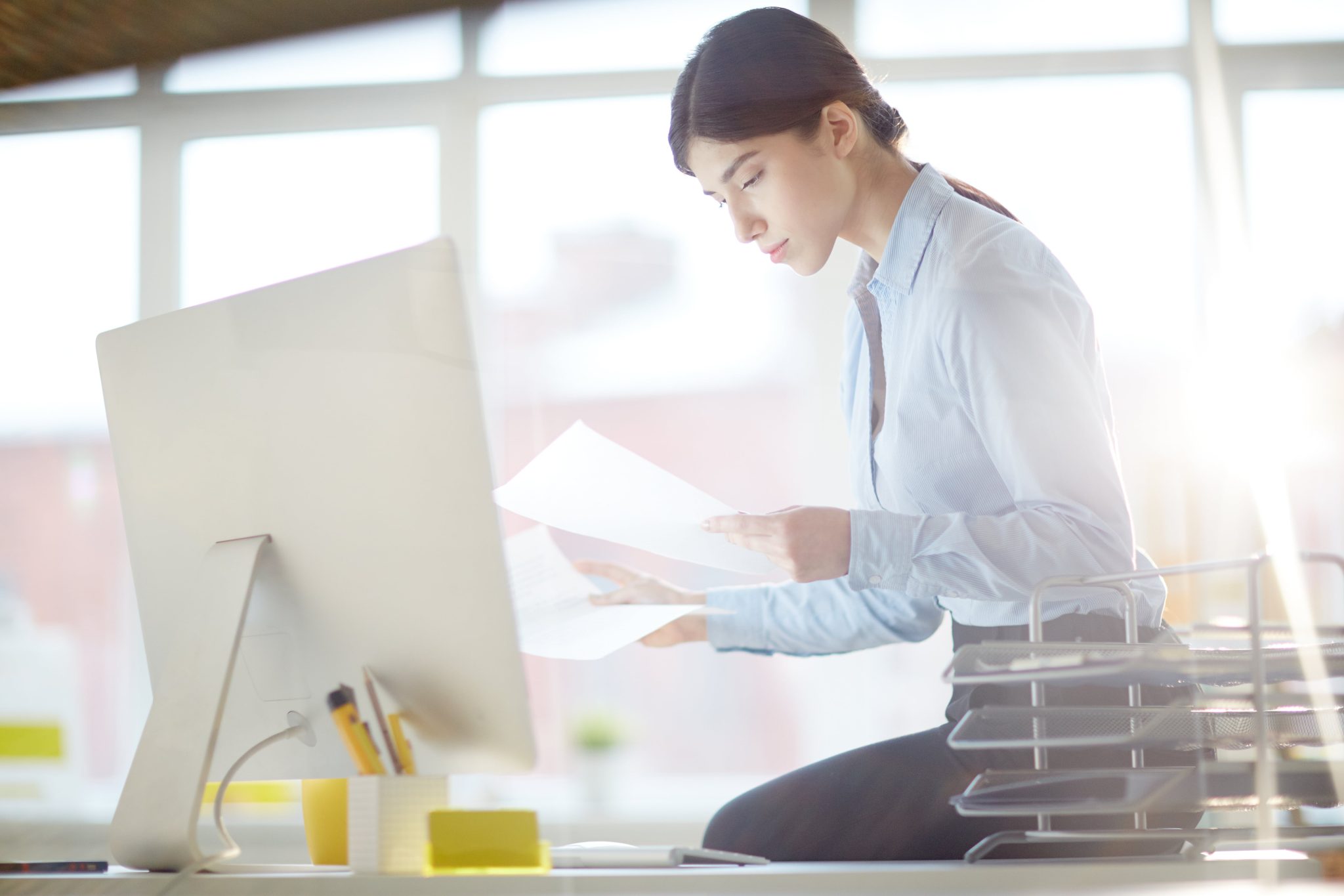 self-employed woman reviewing her quarterly taxes