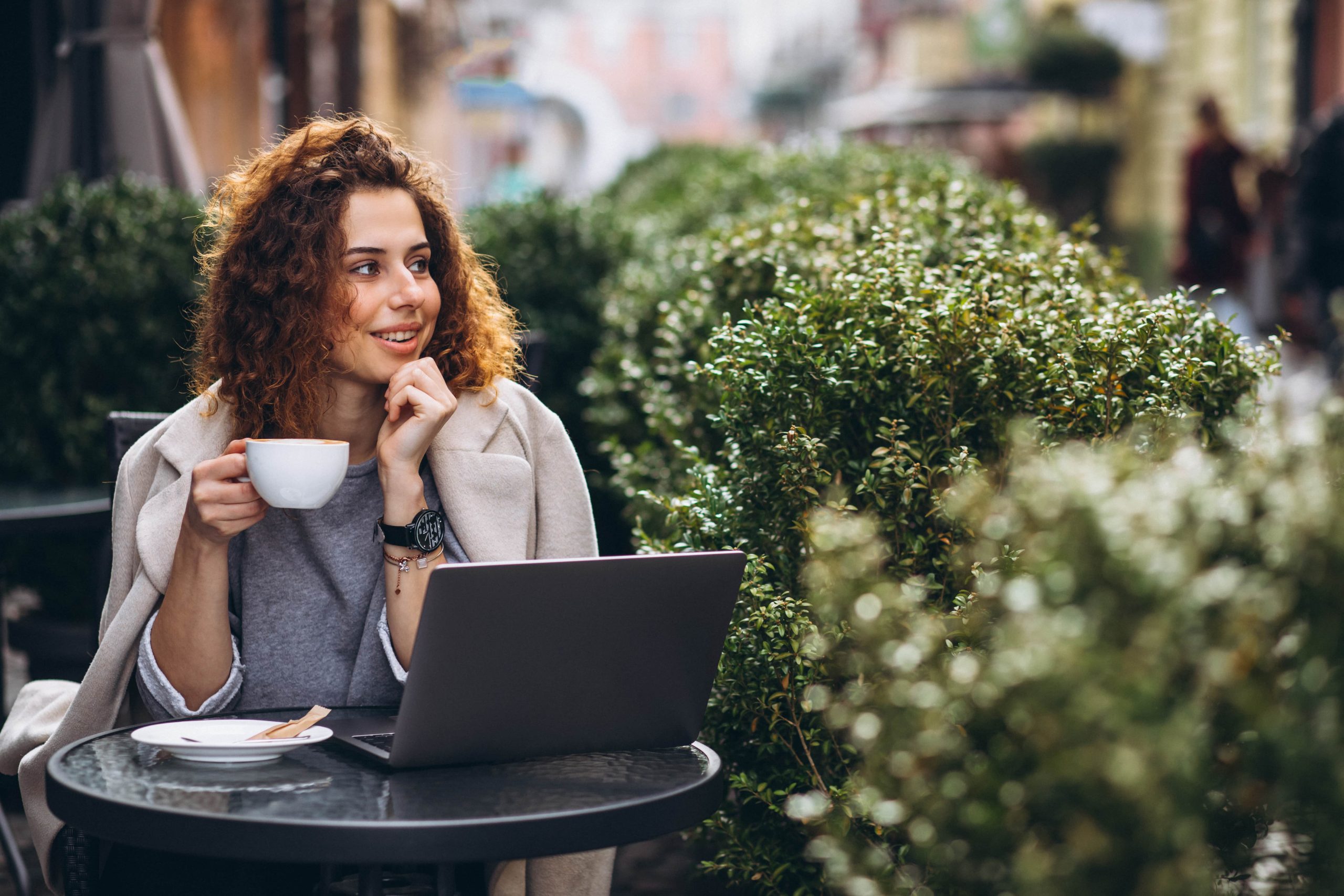 a confident woman managing her vehicle expenses with MileageWise, while ensuring maximum savings