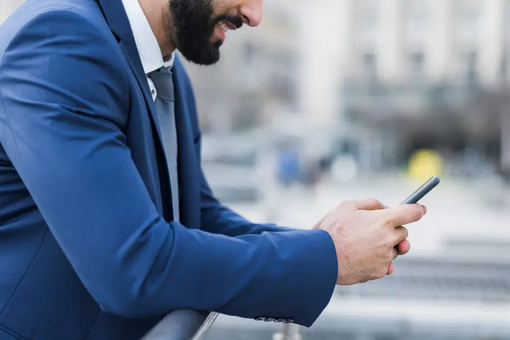 man browsing business mileage trackers